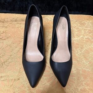 Flat black pointed toe stilettos